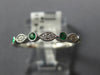 .25CT DIAMOND & AAA EMERALD 18KT WHITE GOLD ROUND & MARQUISE SHAPE FILIGREE RING