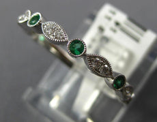 .25CT DIAMOND & AAA EMERALD 18KT WHITE GOLD ROUND & MARQUISE SHAPE FILIGREE RING