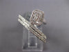 WIDE .77CT DIAMOND 14K WHITE GOLD ROUND & BAGUETTE CRISS CROSS DIAGONAL FUN RING