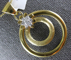 ESTATE .19CT DIAMOND 18KT YELLOW GOLD 3D FLOWER CIRCULAR FUN PENDANT