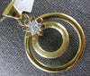 ESTATE .19CT DIAMOND 18KT YELLOW GOLD 3D FLOWER CIRCULAR FUN PENDANT