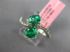 1.33CT DIAMOND & AAA EMERALD 18KT WHITE GOLD OVAL CRISS CROSS INFINITY LOVE RING
