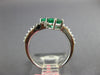 1.33CT DIAMOND & AAA EMERALD 18KT WHITE GOLD OVAL CRISS CROSS INFINITY LOVE RING