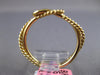 ESTATE SMALL .03CT DIAMOND 14KT YELLOW GOLD CLASSIC SOLITAIRE LOVE KNOT FUN RING