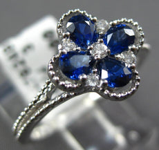 .84CT DIAMOND & AAA SAPPHIRE 18KT WHITE GOLD ROUND & PEAR SHAPE FLOWER LOVE RING