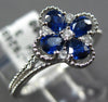 .84CT DIAMOND & AAA SAPPHIRE 18KT WHITE GOLD ROUND & PEAR SHAPE FLOWER LOVE RING