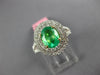 1.69CT DIAMOND & AAA EMERALD 18KT 2 TONE GOLD OVAL DOUBLE HALO ENGAGEMENT RING