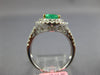 1.69CT DIAMOND & AAA EMERALD 18KT 2 TONE GOLD OVAL DOUBLE HALO ENGAGEMENT RING