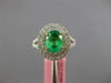 1.69CT DIAMOND & AAA EMERALD 18KT 2 TONE GOLD OVAL DOUBLE HALO ENGAGEMENT RING