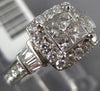 1.01CT DIAMOND 14KT WHITE GOLD ROUND & PRINCESS INVISIBLE SQUARE ENGAGEMENT RING