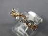 ESTATE .42CT DIAMOND 14KT ROSE & WHITE GOLD SEMI ETERNITY ROPE ANNIVERSARY RING