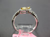 .64CT WHITE & FANCY YELLOW DIAMOND 18KT 2 TONE GOLD MARQUISE & ROUND LEAF RING