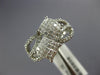 WIDE 1.13CT DIAMOND 18KT WHITE GOLD ROUND & PRINCESSS INVISIBLE SQUARE FUN RING
