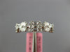 .95CT DIAMOND 18KT WHITE GOLD 3D MULTI SHAPE INVISIBLE CLUSTER ANNIVERSARY RING