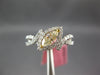 .64CT WHITE & FANCY YELLOW DIAMOND 18KT 2 TONE GOLD MARQUISE & ROUND LEAF RING