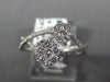 ESTATE .51CT DIAMOND 18KT WHITE GOLD DOUBLE FLOWER LOVE KNOT INFINITY FUN RING