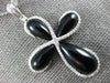LARGE .28CT DIAMOND & AAA BLACK ONYX 14KT WHITE GOLD 3D INFINITY CROSS PENDANT
