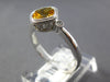 .80CT DIAMOND & AAA CITRINE 14KT WHITE GOLD CUSHION & ROUND 3 STONE BEZEL RING