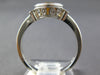 .80CT DIAMOND & AAA CITRINE 14KT WHITE GOLD CUSHION & ROUND 3 STONE BEZEL RING