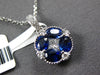 1.62CT DIAMOND & AAA SAPPHIRE 18KT WHITE GOLD OVAL & PRINCESS CUT FLOWER PENDANT