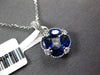 1.62CT DIAMOND & AAA SAPPHIRE 18KT WHITE GOLD OVAL & PRINCESS CUT FLOWER PENDANT