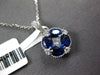 1.62CT DIAMOND & AAA SAPPHIRE 18KT WHITE GOLD OVAL & PRINCESS CUT FLOWER PENDANT