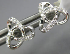 ESTATE .12CT DIAMOND 18KT WHITE GOLD 3D FLOWER LOVE KNOT STAR STUD EARRINGS