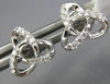 ESTATE .12CT DIAMOND 18KT WHITE GOLD 3D FLOWER LOVE KNOT STAR STUD EARRINGS