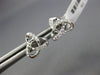 ESTATE .12CT DIAMOND 18KT WHITE GOLD 3D FLOWER LOVE KNOT STAR STUD EARRINGS