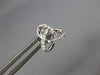 ESTATE .12CT DIAMOND 18KT WHITE GOLD 3D FLOWER LOVE KNOT STAR STUD EARRINGS