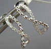 ESTATE .13CT DIAMOND 18KT WHITE GOLD SEMI HOOP INFINITY BEADED HANGING EARRINGS