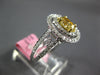 GIA 1.14CT WHITE & FANCY YELLOW DIAMOND 18KT TWO TONE GOLD OVAL ENGAGEMENT RING