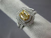 GIA 1.14CT WHITE & FANCY YELLOW DIAMOND 18KT TWO TONE GOLD OVAL ENGAGEMENT RING