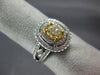 GIA 1.14CT WHITE & FANCY YELLOW DIAMOND 18KT TWO TONE GOLD OVAL ENGAGEMENT RING