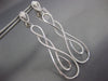 ESTATE LARGE .69CT DIAMOND 18KT WHITE GOLD INFINITY TEAR DROP HANGING EARRINGS