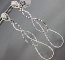ESTATE LARGE .77CT DIAMOND 18KT WHITE GOLD TEAR DROP INFINITY HANGING EARRINGS