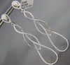 ESTATE LARGE .77CT DIAMOND 18KT WHITE GOLD TEAR DROP INFINITY HANGING EARRINGS