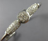 ESTATE .62CT DIAMOND 14KT WHITE GOLD ROUND & BAGUETTE INVISIBLE BANGLE BRACELET