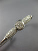ESTATE .62CT DIAMOND 14KT WHITE GOLD ROUND & BAGUETTE INVISIBLE BANGLE BRACELET