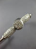 ESTATE .62CT DIAMOND 14KT WHITE GOLD ROUND & BAGUETTE INVISIBLE BANGLE BRACELET