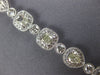 WIDE 7.85CT WHITE & FANCY YELLOW DIAMOND 18KT WHITE GOLD 3D HALO TENNIS BRACELET