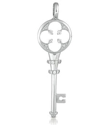 .32CT DIAMOND 14KT WHITE GOLD 3D OPEN 4 LEAF CLOVER KEY TO YOUR HEART PENDANT