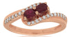 .60CT DIAMOND & AAA RUBY 14KT ROSE GOLD OVAL & ROUND 2 STONE DIAGONAL LOVE RING