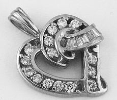 1.16CT DIAMOND 14KT WHITE GOLD ROUND & BAGUETTE LOVE KNOT HEART FLOATING PENDANT