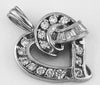 1.16CT DIAMOND 14KT WHITE GOLD ROUND & BAGUETTE LOVE KNOT HEART FLOATING PENDANT