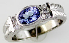 .87CT DIAMOND & AAA TANZANITE 14KT WHITE GOLD OVAL & ROUND DOUBLE ROW BEZEL RING