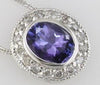 ESTATE 1.55CT DIAMOND & AAA TANZANITE 14KT WHITE GOLD OVAL & ROUND BEZEL PENDANT
