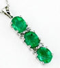 ESTATE 1.05CT DIAMOND & AAA EMERALD 14K WHITE GOLD OVAL & ROUND FLOATING PENDANT